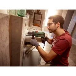 Bosch 600 W Schlagbohrmaschine EasyImpact 600 Inkl. Tiefenanschlag -Heimwerkzeuge 352075 3058 07